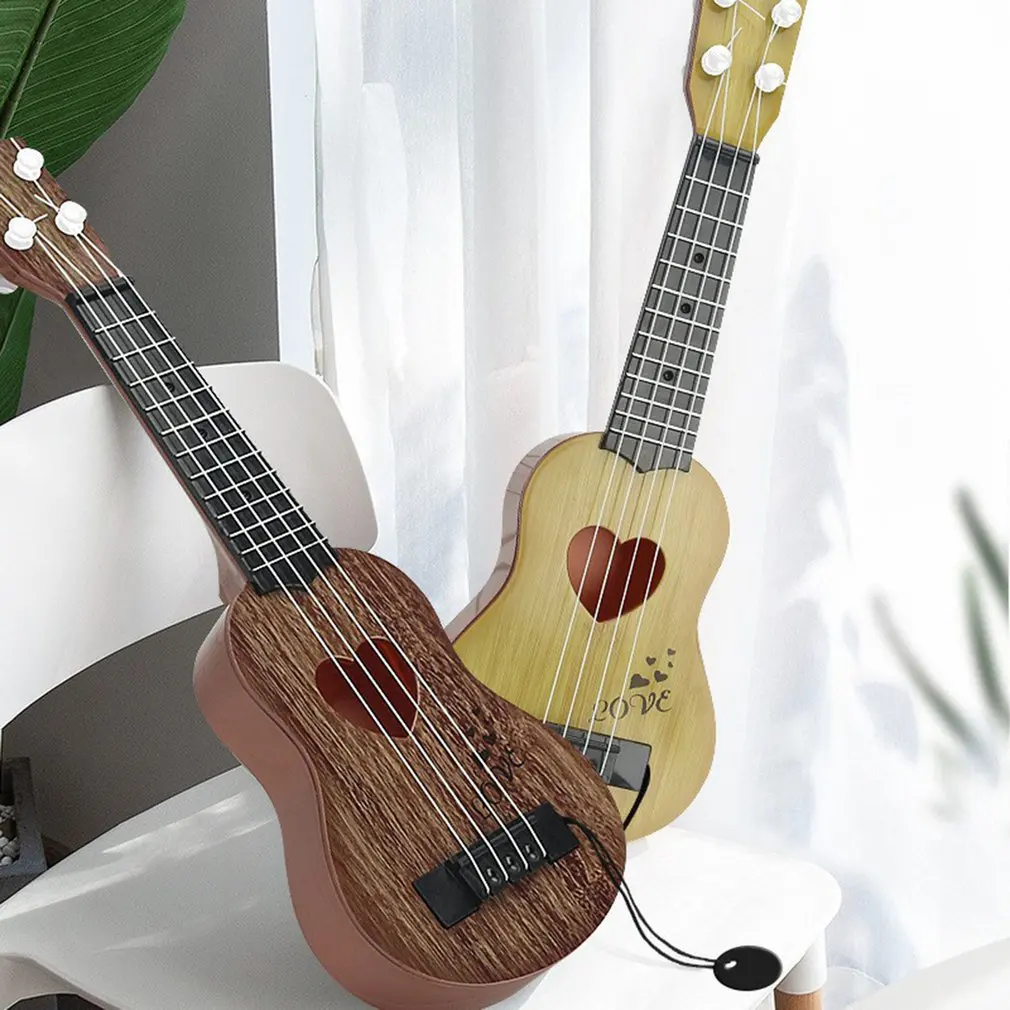 Ukulele Children's Guitar Toy Rhythm Trend Can Play Mini Ukulele Simulation Instrument Birthday Holiday Gift
Ukulele Children's Guitar Toy Rhythm Trend Can Play Mini Ukulele Simulation Instrument Birthday Holiday Gift