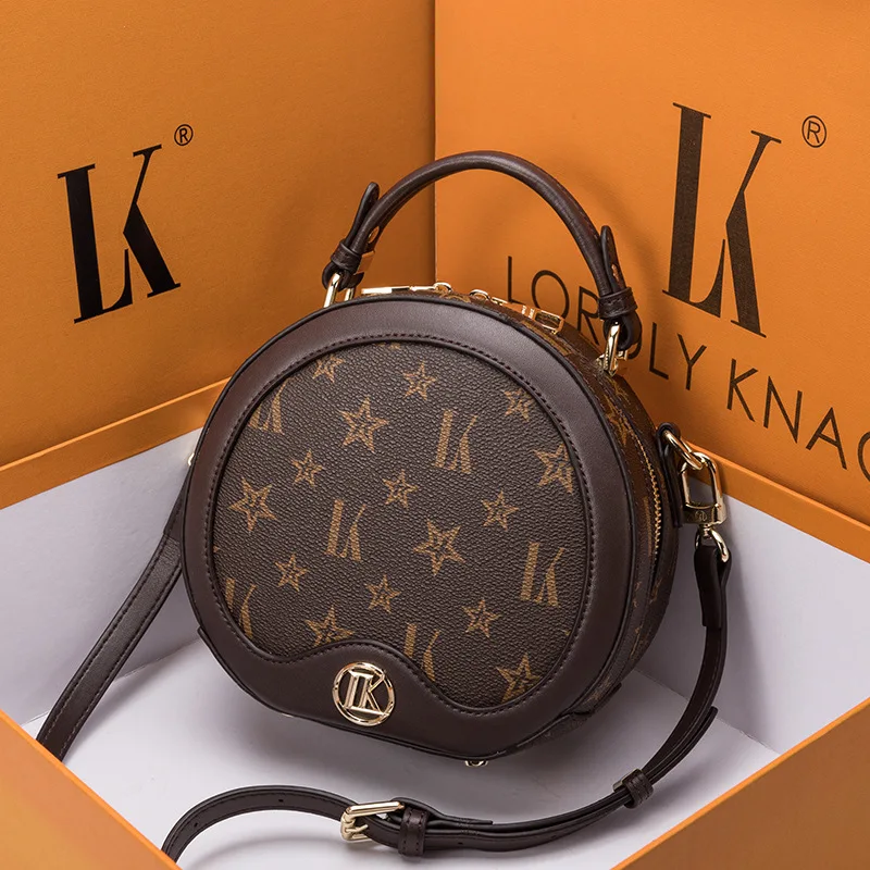 Genuine Leather 2021 New Fashion One-shoulder Messenger Portable Small Round Bag Designer Handbags High Quality Purses Sac Luxe
Genuine Leather 2021 New Fashion One-shoulder Messenger Portable Small Round Bag Designer Handbags High Quality Purses Sac Luxe