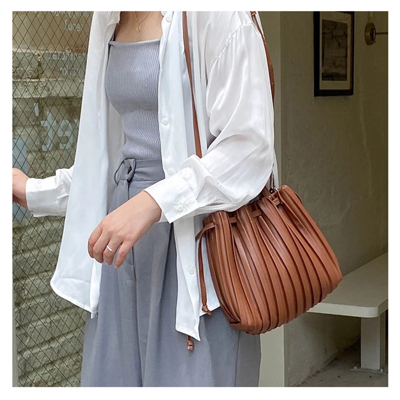 Дизайнерские женские сумочки, Новая Модная креативная сумка из искусственной кожи, складная сумка-мешок на шнурке 01-SB-zzcdqd 
Дизайнерские женские сумочки, Новая Модная креативная сумка из искусственной кожи, складная сумка-мешок на шнурке 01-SB-zzcdqd