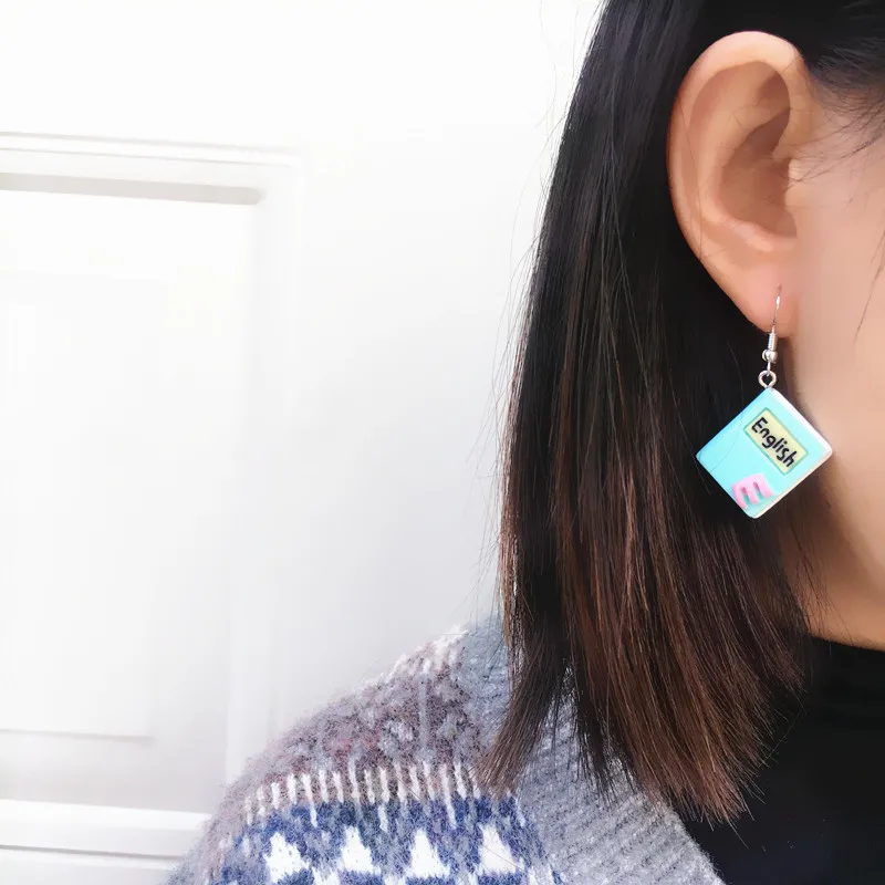 New Fashion Christmas Earrings for Women Creative Hand-made Children's Book Pen Holder Ear Hook Cartoon Funny Clip on Earrings 
New Fashion Christmas Earrings for Women Creative Hand-made Children's Book Pen Holder Ear Hook Cartoon Funny Clip on Earrings