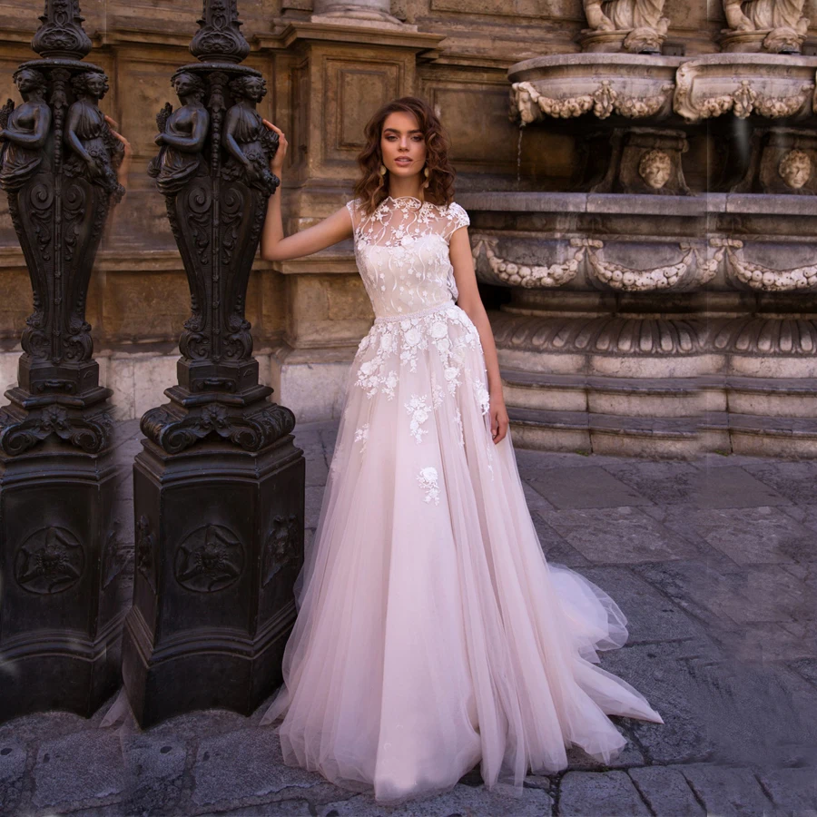 Elegant O-neck Applique Lace Tulle A-line Wedding Dresses With Beading Sashes Cap Sleeves Bride Dress For Women
Elegant O-neck Applique Lace Tulle A-line Wedding Dresses With Beading Sashes Cap Sleeves Bride Dress For Women