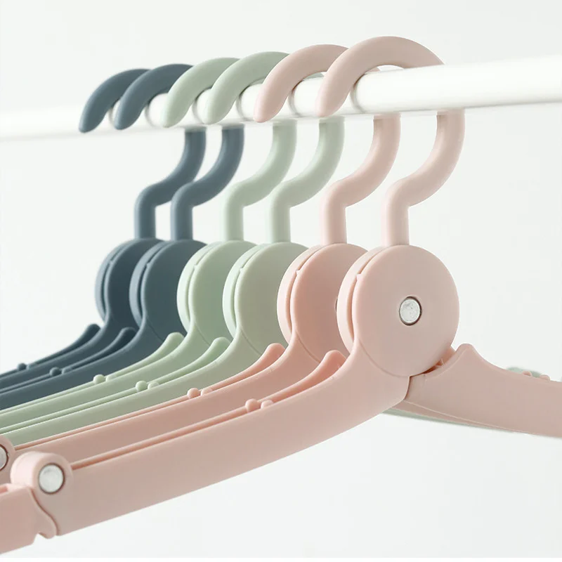 5 PCS Simple Portable Clothes Hanger Racks Foldable Plastic Travel Hangers Windproof Non-slip Coats Hanger Clothing Organizer 
5 PCS Simple Portable Clothes Hanger Racks Foldable Plastic Travel Hangers Windproof Non-slip Coats Hanger Clothing Organizer