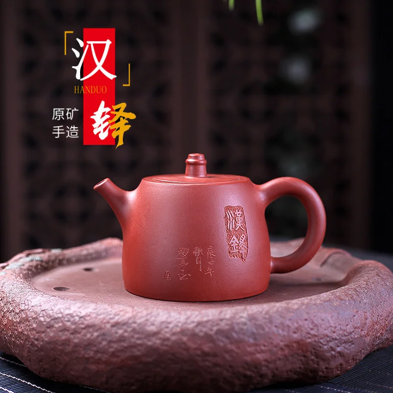 Yixing purple clay pot handmade raw ore Dahongpao engraved Han duo engraved tea pot
Yixing purple clay pot handmade raw ore Dahongpao engraved Han duo engraved tea pot