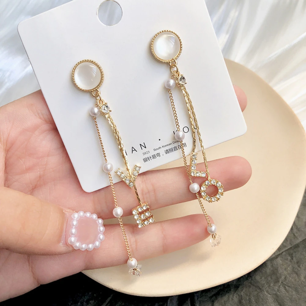 Creative Fashion love letters Earrings Female long Temperament Senior Sense Tassel Personality Jewelry
Creative Fashion love letters Earrings Female long Temperament Senior Sense Tassel Personality Jewelry