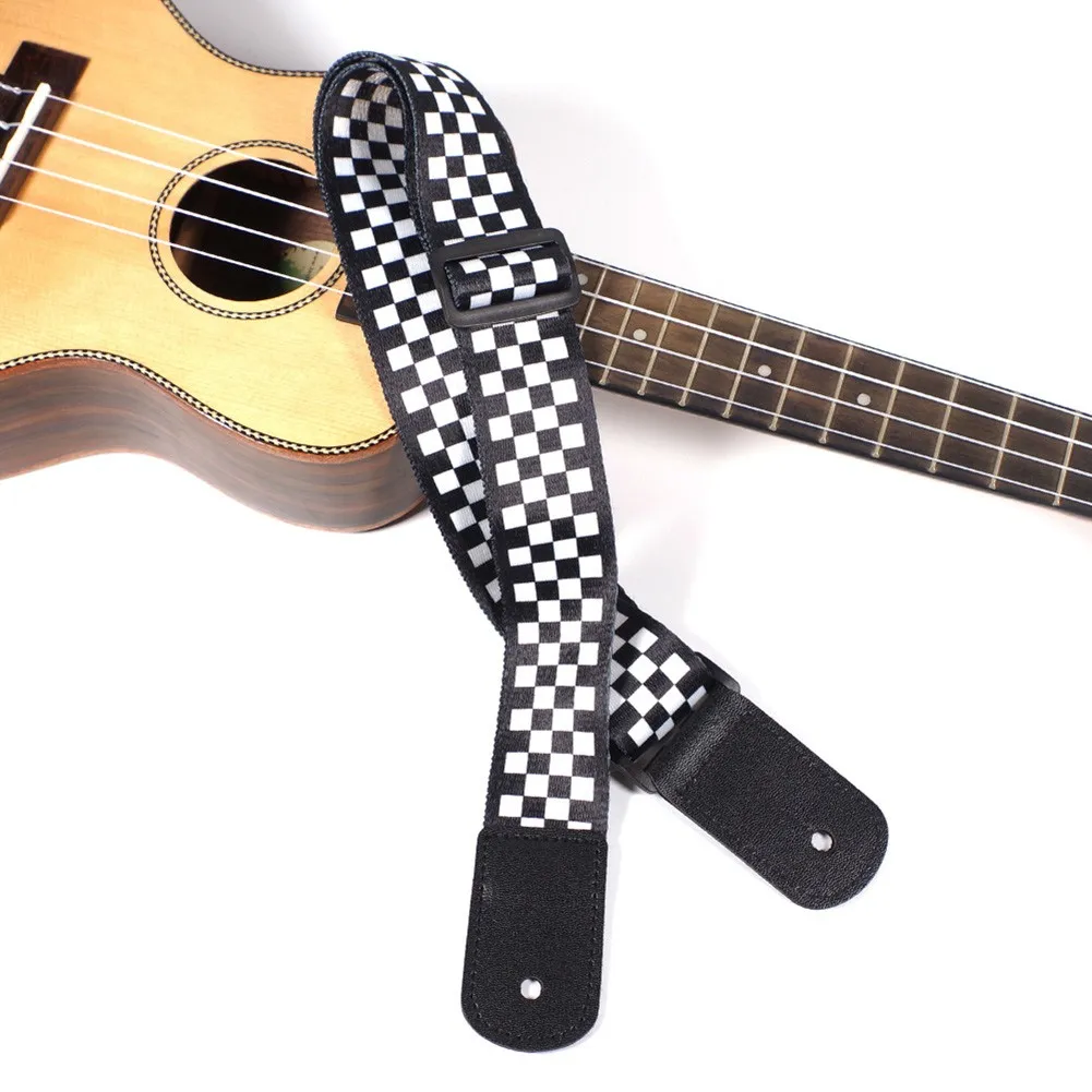 New 1Pc Adjustable Ukulele Strap Black White Plaid Leather Belt Acoustic Bass Guitar For 21 23 26 Inch Classic Style 104cm Part
New 1Pc Adjustable Ukulele Strap Black White Plaid Leather Belt Acoustic Bass Guitar For 21 23 26 Inch Classic Style 104cm Part