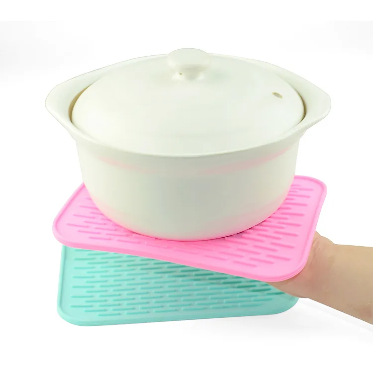Silicone drain pad Insulation pads European anti-scalding pan Table waterproof Car phone mat
Silicone drain pad Insulation pads European anti-scalding pan Table waterproof Car phone mat
