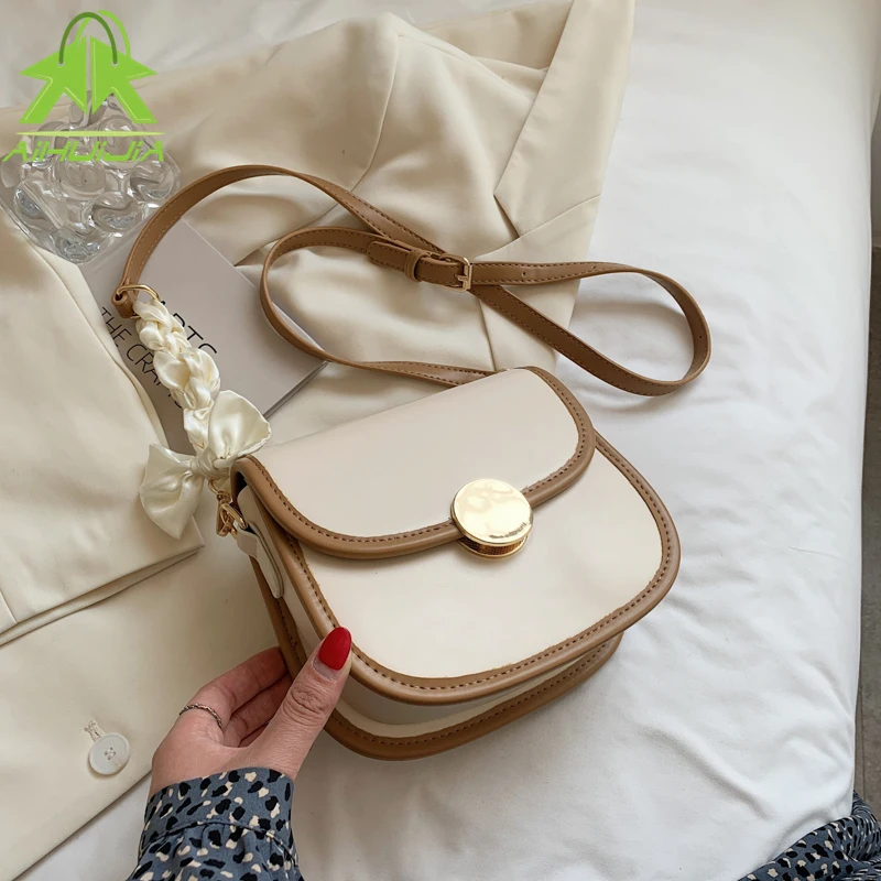Solid Color Fashion New Shoulder Handbags Ribbons Chain Simple Messenger Bags Elegant Small PU Leather Crossbody Bags For Women
Solid Color Fashion New Shoulder Handbags Ribbons Chain Simple Messenger Bags Elegant Small PU Leather Crossbody Bags For Women