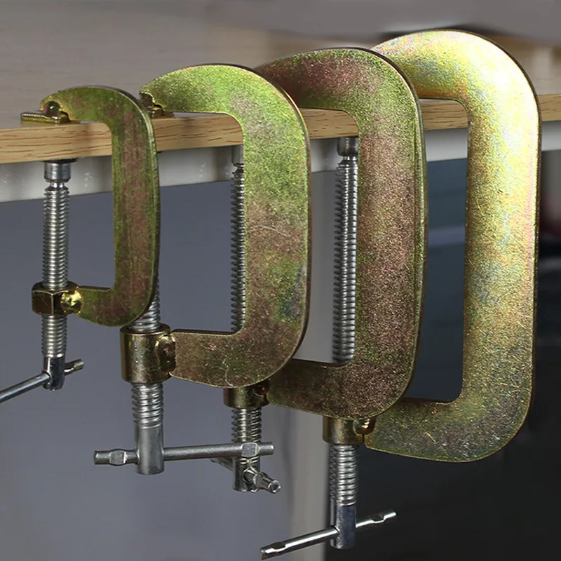 Adjust Heavy Duty G Clamp 1/10inch C/W Soft Jaw Pads 63mm -252mm Clamping D Clamp steel For Woodwork Metal Screw Fixing tool
Adjust Heavy Duty G Clamp 1/10inch C/W Soft Jaw Pads 63mm -252mm Clamping D Clamp steel For Woodwork Metal Screw Fixing tool