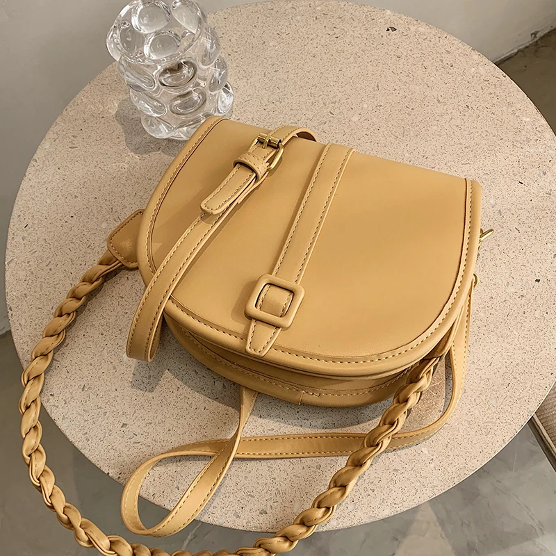 Spring and Summer New Solid Color Flip Saddle Bag High-quality PU Leather Women's Designer Handbag Shoulder Messenger Bag Purses
Spring and Summer New Solid Color Flip Saddle Bag High-quality PU Leather Women's Designer Handbag Shoulder Messenger Bag Purses