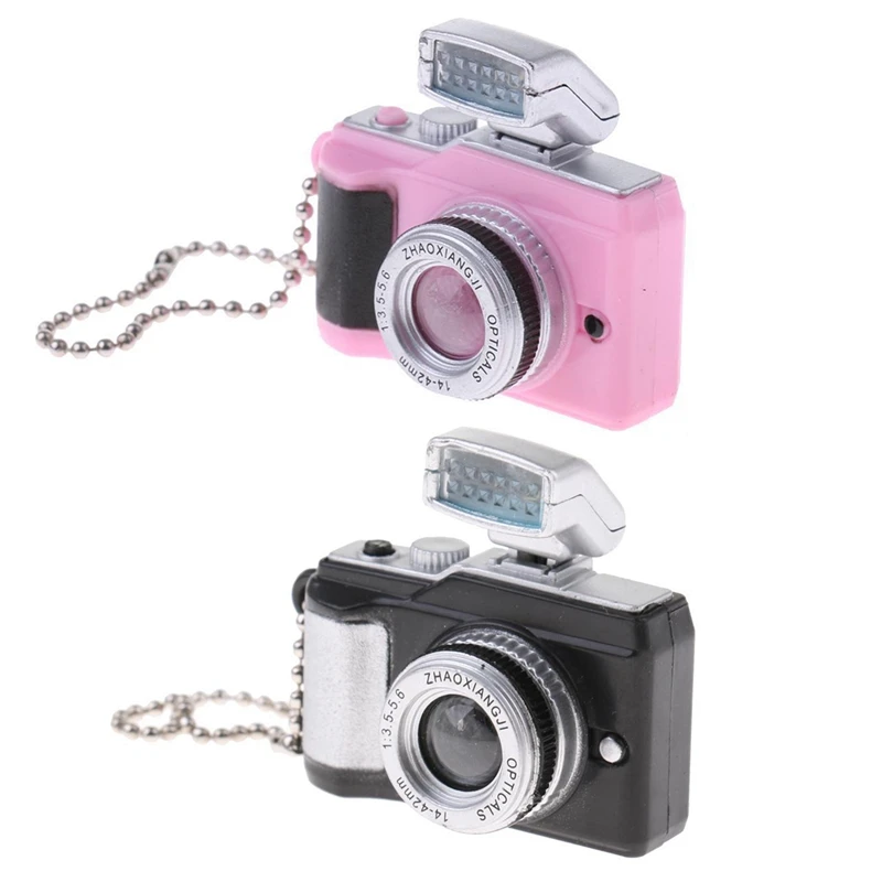 2Pcs 1:8 Scale Dollhouse Miniature Digital SLR Camera Dolls House Decoration Accessory - Black & Pink
2Pcs 1:8 Scale Dollhouse Miniature Digital SLR Camera Dolls House Decoration Accessory - Black & Pink