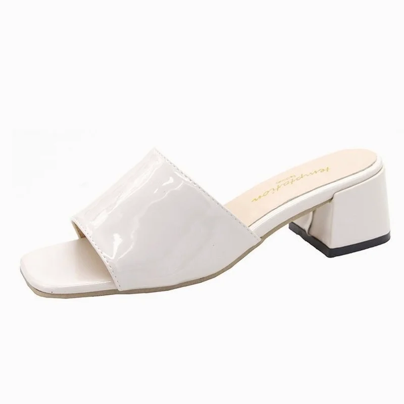 Summer New Style Sandals Women's Square Head Patent Leather Candy One Word Thick Heel Middle Heel Fashion Slippers
Summer New Style Sandals Women's Square Head Patent Leather Candy One Word Thick Heel Middle Heel Fashion Slippers