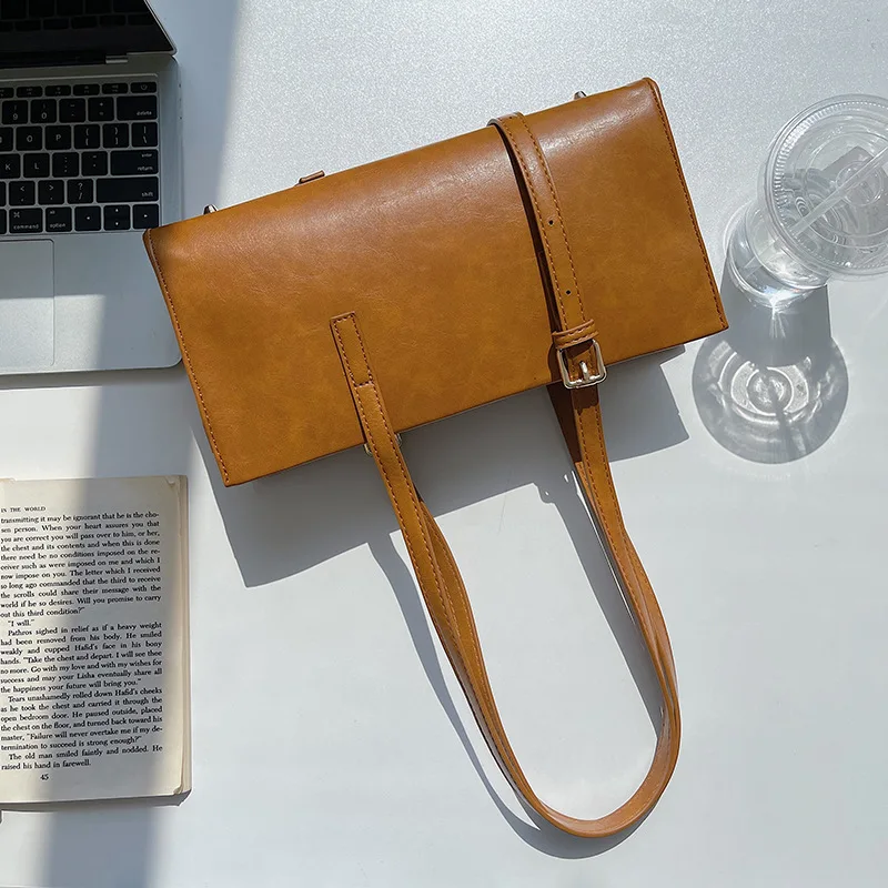 Retro leather grain women's fashion trend shoulder bags, stereotyped personality portable female bags, large-capacity retro tote
Retro leather grain women's fashion trend shoulder bags, stereotyped personality portable female bags, large-capacity retro tote