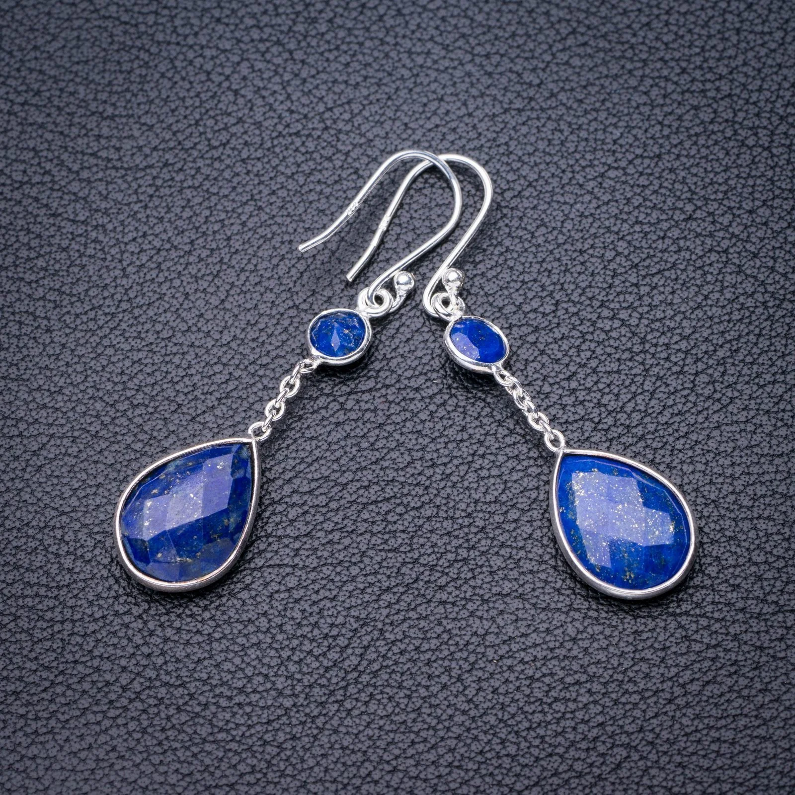 Серьги ручной работы из серебра 1,75 пробы с рисунком звездных звёзд
Серьги ручной работы из серебра 1,75 пробы с рисунком звездных звёзд