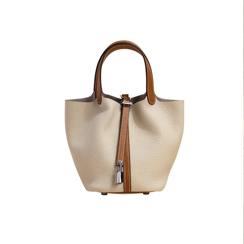 Bag 2021 new bag color contrast vegetable basket women's bag bucket bag spring and summer versatile hand leather 
Bag 2021 new bag color contrast vegetable basket women's bag bucket bag spring and summer versatile hand leather