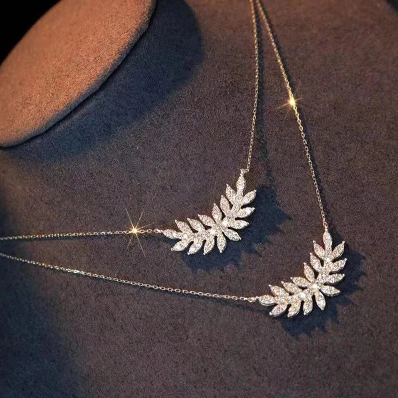 Unique design silver inlaid zircon delicate geometric leaf necklace women's crystal jewelry trend accessories
Unique design silver inlaid zircon delicate geometric leaf necklace women's crystal jewelry trend accessories