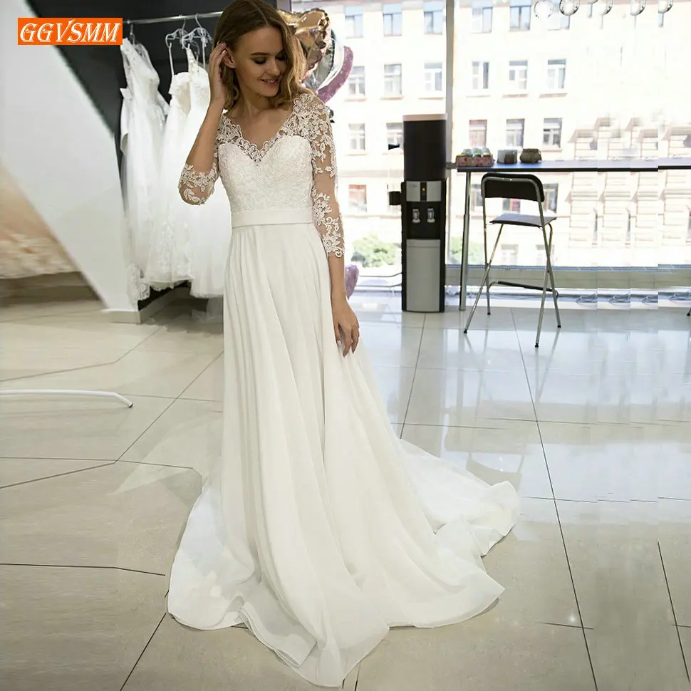 Женское свадебное платье с кружевной аппликацией, белое шифоновое платье в стиле бохо с V-образным вырезом и рукавами 3/4, на молнии, на пугови... 
Женское свадебное платье с кружевной аппликацией, белое шифоновое платье в стиле бохо с V-образным вырезом и рукавами 3/4, на молнии, на пугови...