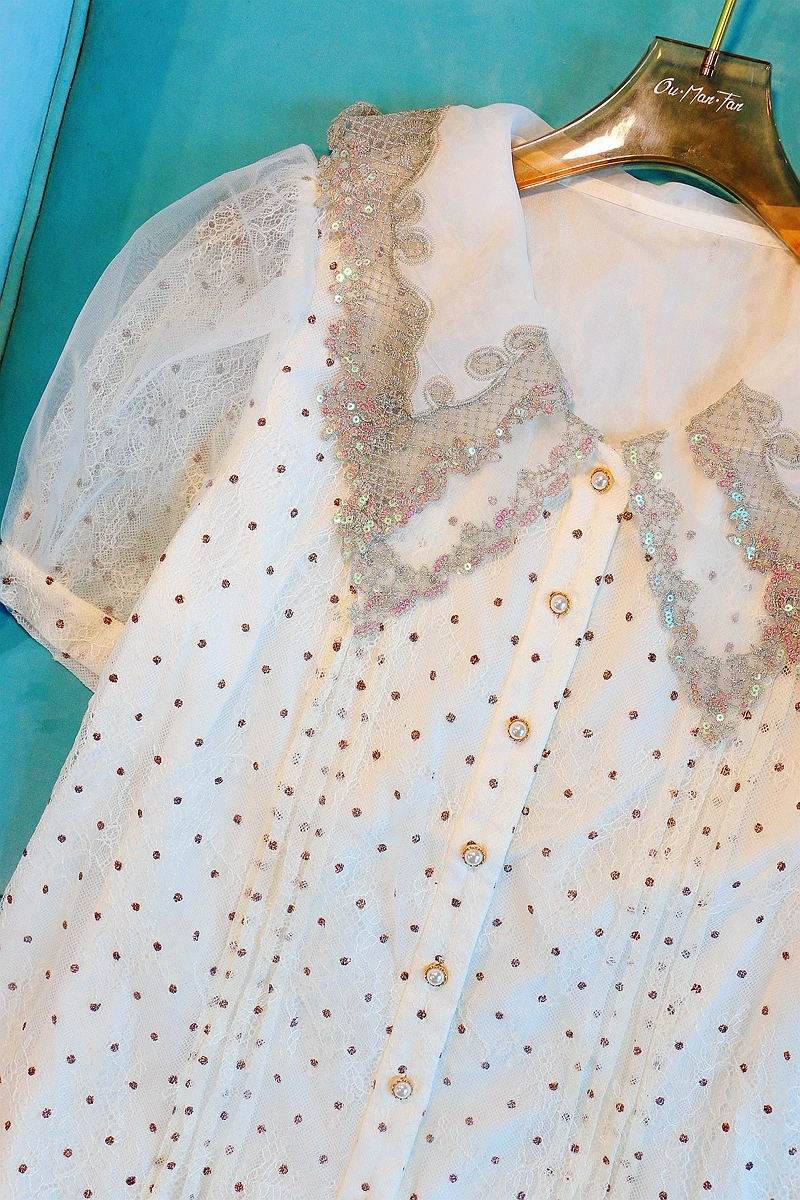 Summer French Style Embroidery Sequined Polka Dot Peter Pan Collar Blouse Women Short Puff Sleeve Lace Shirt
Summer French Style Embroidery Sequined Polka Dot Peter Pan Collar Blouse Women Short Puff Sleeve Lace Shirt