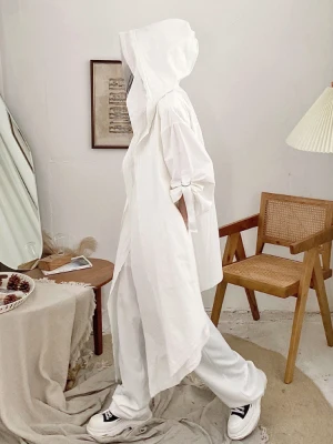 Spring new minority design feel hair edge loose medium-length deconstruction hooded designer trench coat lady
Spring new minority design feel hair edge loose medium-length deconstruction hooded designer trench coat lady