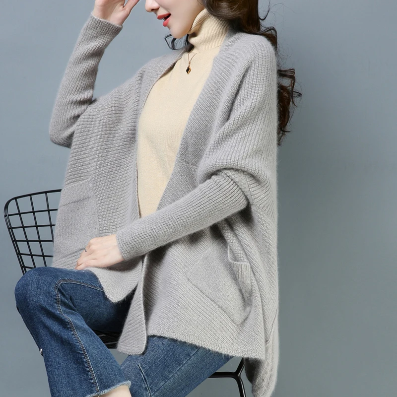 Casual Women Loose Cardigans Coats Autumn new fashion Pockets Thick Sweater Solid color Knitted Batwing Sleeve Tops womens
Casual Women Loose Cardigans Coats Autumn new fashion Pockets Thick Sweater Solid color Knitted Batwing Sleeve Tops womens