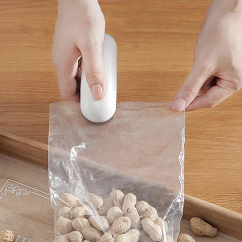 Mini Sealing Machine Portable Bag Clips Handheld Sealer Packing Plastic Bag Food Saver Storage Snack Clips Home Kitchen Supplies
Mini Sealing Machine Portable Bag Clips Handheld Sealer Packing Plastic Bag Food Saver Storage Snack Clips Home Kitchen Supplies