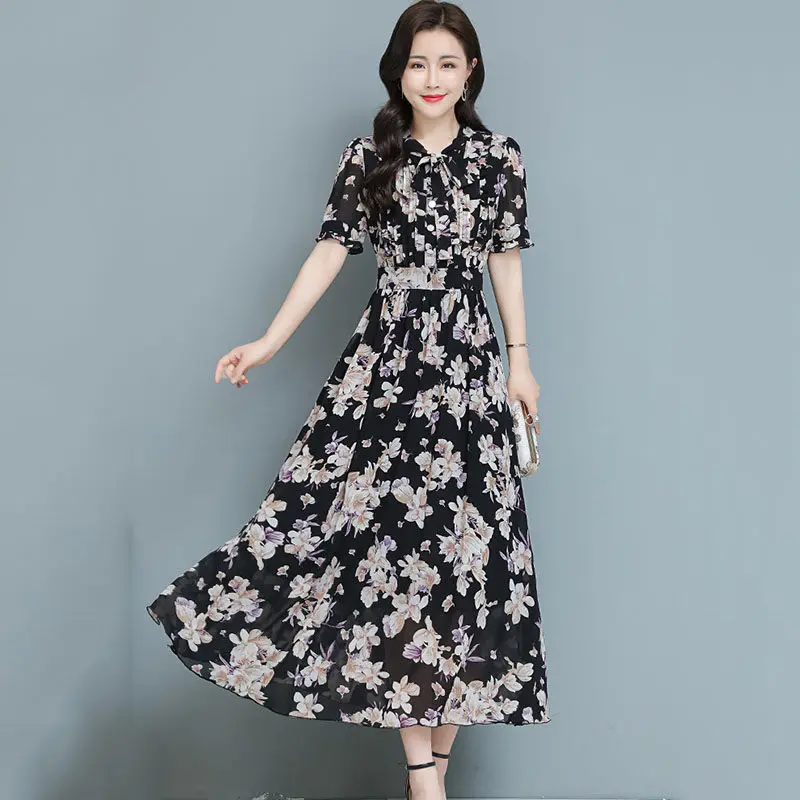 2021 Summer New Short Sleeve Printed Chiffon Dress Female High Waist Temperament Waist Bohemian Beach Dress Long Vestidos aq585
2021 Summer New Short Sleeve Printed Chiffon Dress Female High Waist Temperament Waist Bohemian Beach Dress Long Vestidos aq585