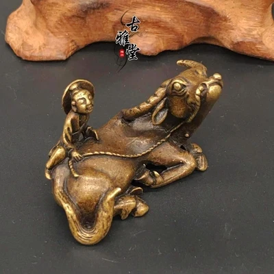 Exquisite tea pet ornaments put cow boy pure copper small ornaments bronze ox handle piece solid copper old copper art
Exquisite tea pet ornaments put cow boy pure copper small ornaments bronze ox handle piece solid copper old copper art