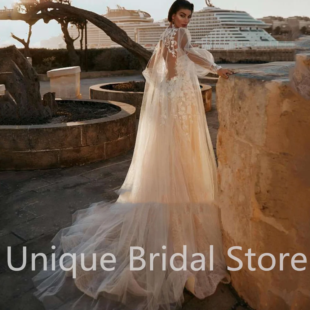 Champagne A-Line Wedding Dress Sweethear Long Sleeves Backless Lace Appliques Sweep Train 2021 Bride Gowns Vestido De Noiva
Champagne A-Line Wedding Dress Sweethear Long Sleeves Backless Lace Appliques Sweep Train 2021 Bride Gowns Vestido De Noiva
