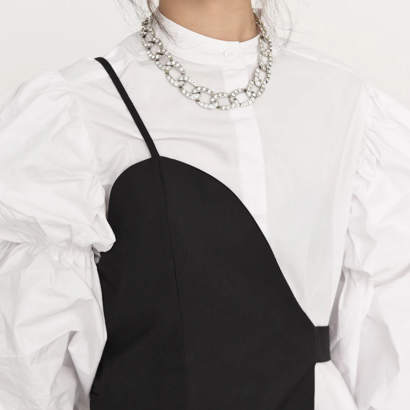 Fit Women Loose Black Brief Irregular Spliced Vest New V-collar Sleeveless Fashion Tide Spring Autumn 2021 1DB18301
Fit Women Loose Black Brief Irregular Spliced Vest New V-collar Sleeveless Fashion Tide Spring Autumn 2021 1DB18301