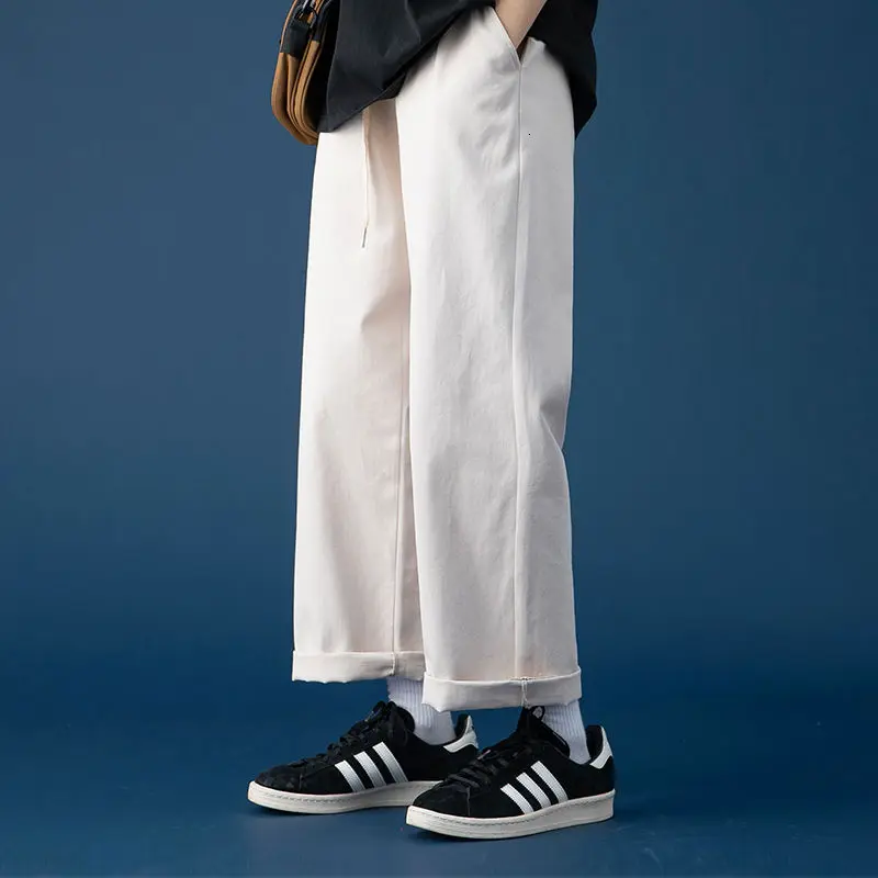 Женская одежда, нейтральные брюки, новинка сезона весна-лето 2021, однотонные Простые повседневные широкие брюки, модные белые уличные брюки ...
Женская одежда, нейтральные брюки, новинка сезона весна-лето 2021, однотонные Простые повседневные широкие брюки, модные белые уличные брюки ...