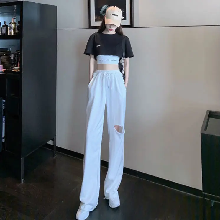 Summer white sports pants high waist hole casual wide leg pants women's thin Korean loose versatile pants
Summer white sports pants high waist hole casual wide leg pants women's thin Korean loose versatile pants