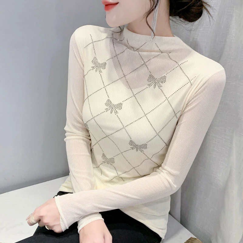 Европейские товары, тяжелая вышивка, популярная футболка с длинными рукавами, Женская облегающая футболка в западном стиле на осень и зиму ...
Европейские товары, тяжелая вышивка, популярная футболка с длинными рукавами, Женская облегающая футболка в западном стиле на осень и зиму ...