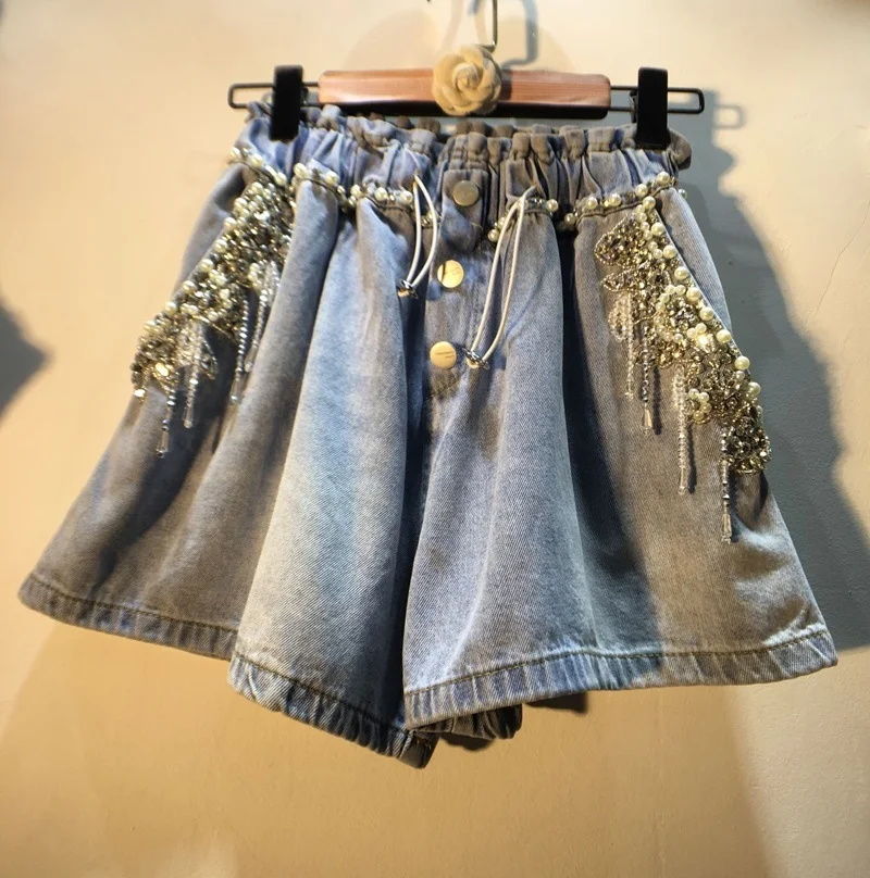 Denim Hot Pants Womens 2021 Summer Wear New Heavy Industry Tassel Bead Diamond-Embedded High Waist Slimming Wide-Leg Shorts
Denim Hot Pants Womens 2021 Summer Wear New Heavy Industry Tassel Bead Diamond-Embedded High Waist Slimming Wide-Leg Shorts