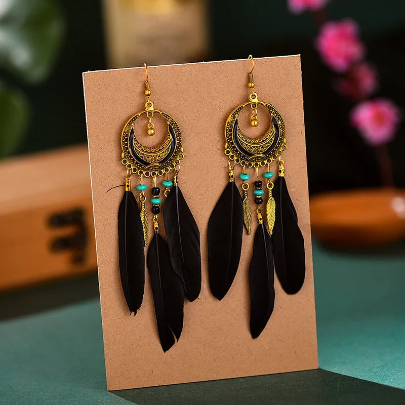 Creative Feather Earrings Bohemian National Wind Crescent Long Section Feather Tassel Earrings Female Retro Ethnic Earrings
Creative Feather Earrings Bohemian National Wind Crescent Long Section Feather Tassel Earrings Female Retro Ethnic Earrings