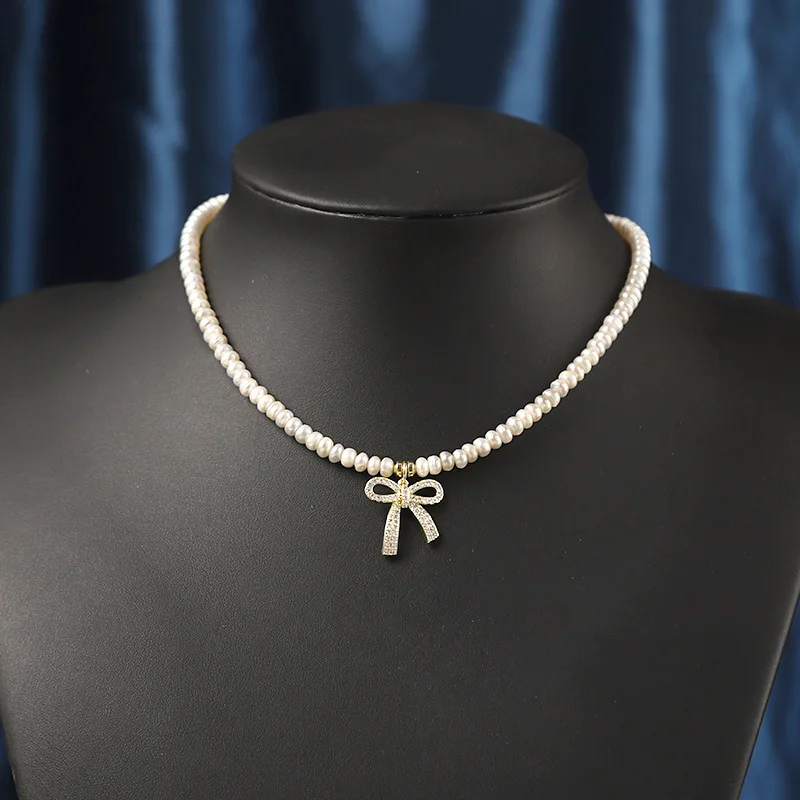 

Французское романтическое Элегантное ожерелье с натуральным пресноводным жемчугом, подвеска с микро-инкрустацией из циркония и бантом, цепочка до ключиц
