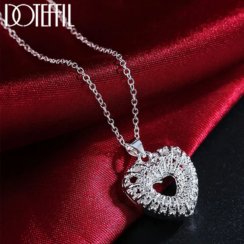 DOTEFFIL 925 Sterling Silver 18 Inch Heart-Shaped Hollow AAA Zircon Pendant Necklace For Women Fashion Wedding Charm Jewelry 
DOTEFFIL 925 Sterling Silver 18 Inch Heart-Shaped Hollow AAA Zircon Pendant Necklace For Women Fashion Wedding Charm Jewelry
