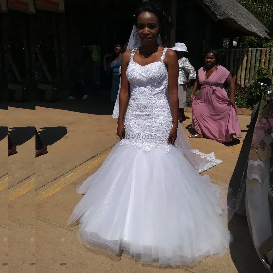 Mermaid Africa Wedding Dress Lace Appliques Beaded Pearls Spaghetti Straps Trumpet Bridal Gowns Elegant robe de mariage sirene
Mermaid Africa Wedding Dress Lace Appliques Beaded Pearls Spaghetti Straps Trumpet Bridal Gowns Elegant robe de mariage sirene