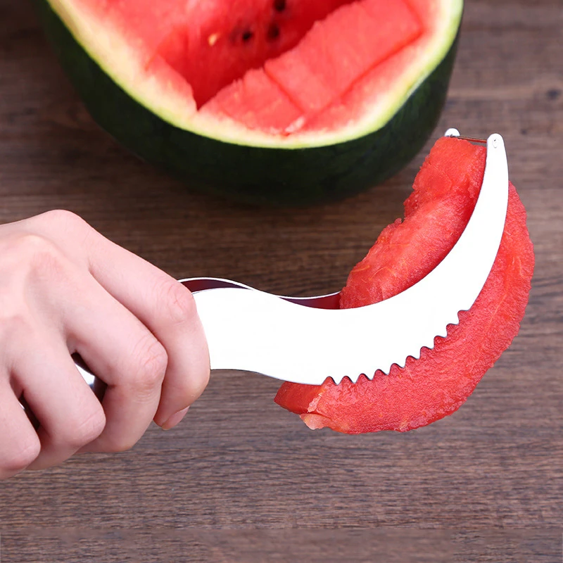 Watermeloen van roestvrij staal, snijend artefactslice... meloen etend fruit snijgereedschap.
Watermeloen van roestvrij staal, snijend artefactslice... meloen etend fruit snijgereedschap.
