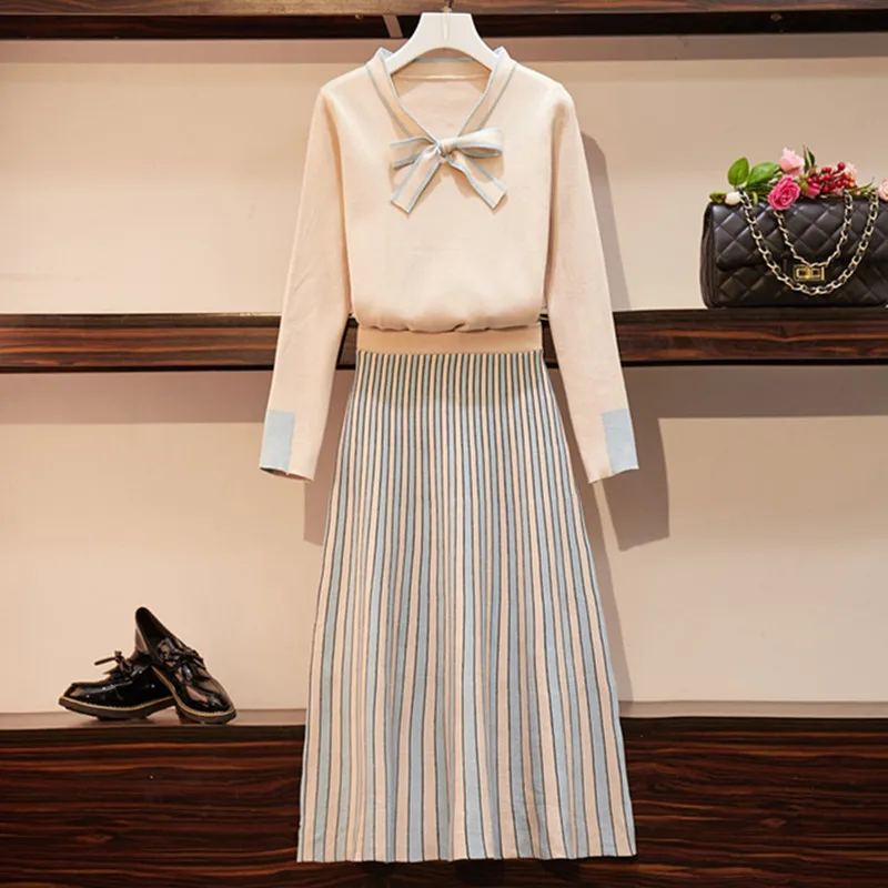 High Quality 2021 New Autumn Chic Knit Skirt 2 Piece Set Women Lace up Sweater Top+Elastic Waist Stripe Skirts Elegant Lady Suit
High Quality 2021 New Autumn Chic Knit Skirt 2 Piece Set Women Lace up Sweater Top+Elastic Waist Stripe Skirts Elegant Lady Suit