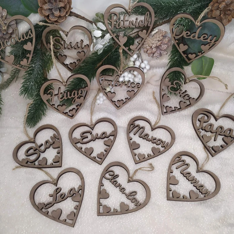 Personalized Christmas decoration, wooden heart-shaped commemorative name Christmas ball, creative Christmas gift
Personalized Christmas decoration, wooden heart-shaped commemorative name Christmas ball, creative Christmas gift