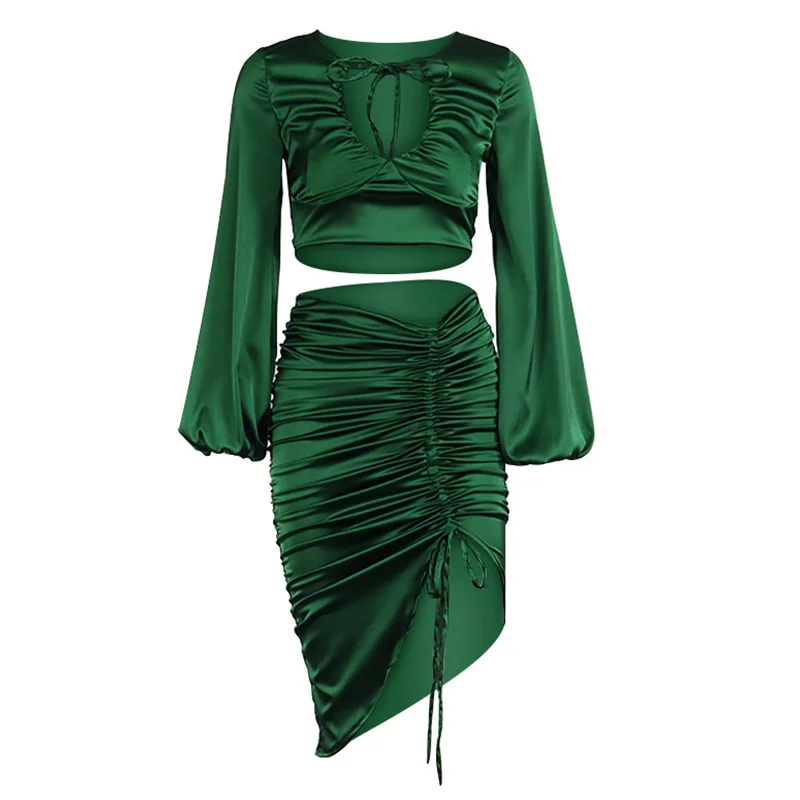 European and American spring and summer new women's sexy V-neck lace up Lantern Sleeve pleated jacket long skirt two piece suit 
European and American spring and summer new women's sexy V-neck lace up Lantern Sleeve pleated jacket long skirt two piece suit