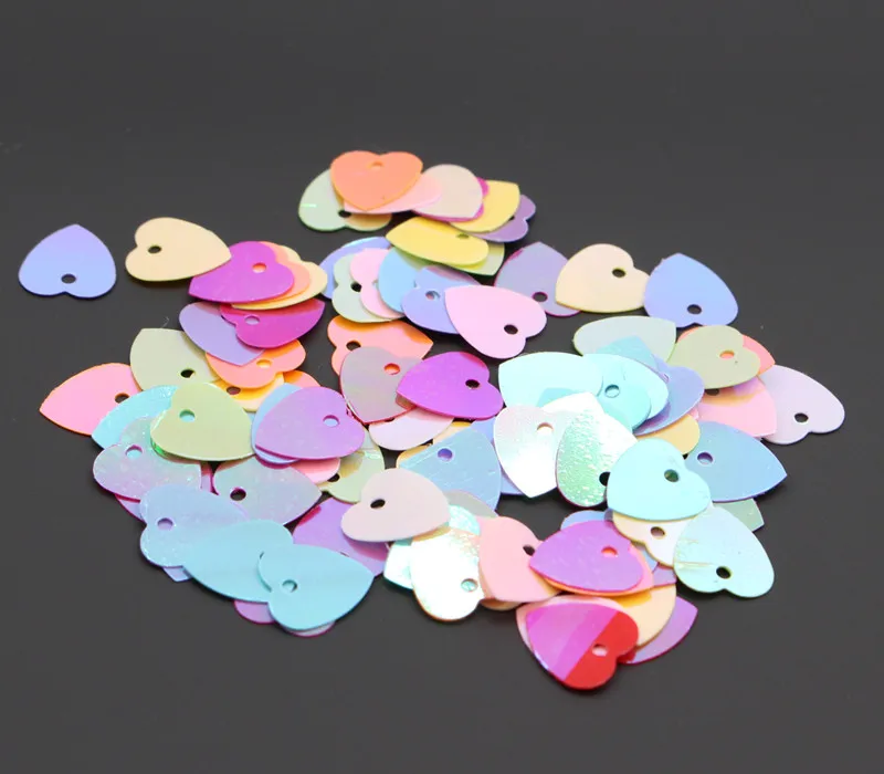 100Pcs/Lot 10mm Heart Shape Mixed Color Sequins PVC Loose Paillettes DIY Sewing Handicraft Wedding Craft Lentejuelas Accessories
100Pcs/Lot 10mm Heart Shape Mixed Color Sequins PVC Loose Paillettes DIY Sewing Handicraft Wedding Craft Lentejuelas Accessories