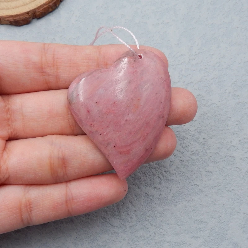 Natural Rhodonite Teardrop Gemstone 45x35x6mm13.5g 
Natural Rhodonite Teardrop Gemstone 45x35x6mm13.5g