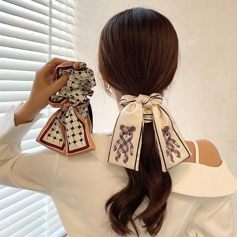 New Women Elegant Print Bear Plaid Bow Silk Scrunchie Sweet Hair Tie Headband Soft Elastic Hair Bands Fashion Hair Accessories
New Women Elegant Print Bear Plaid Bow Silk Scrunchie Sweet Hair Tie Headband Soft Elastic Hair Bands Fashion Hair Accessories