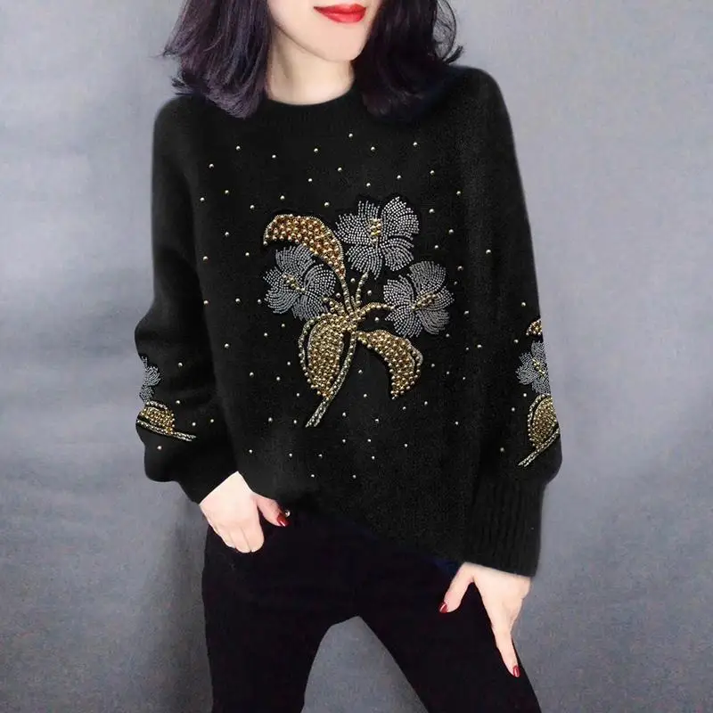 Fashion loose round neck short Pullover black sweater women's European station 2021 spring new European fashion 
Fashion loose round neck short Pullover black sweater women's European station 2021 spring new European fashion