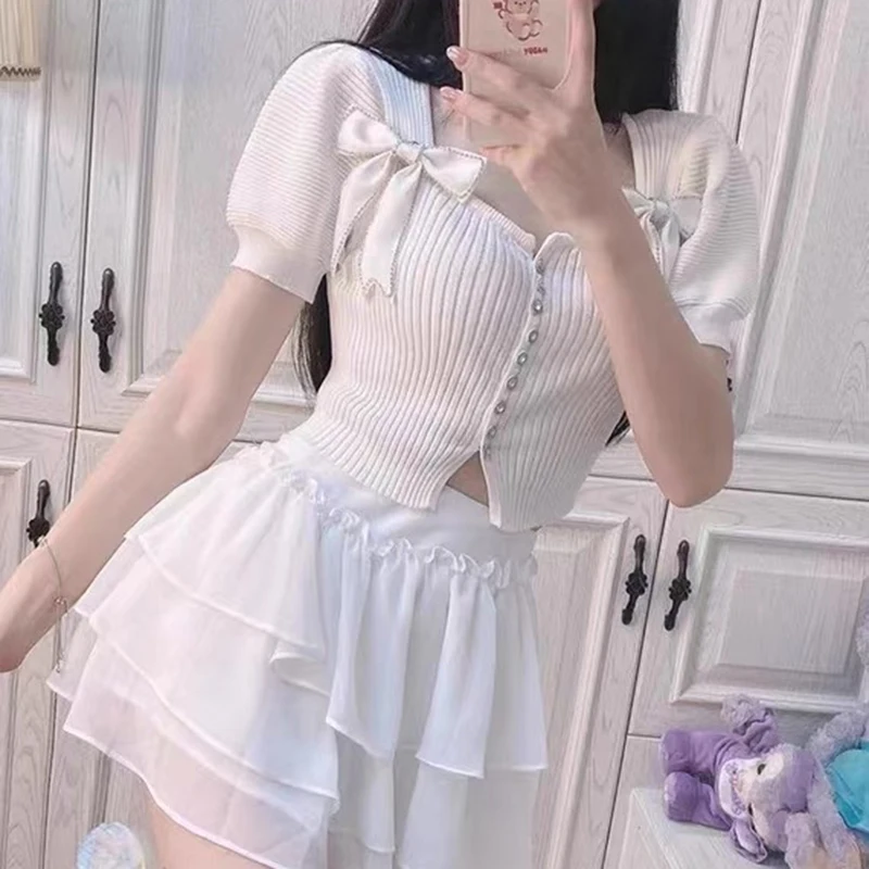 Summer JK Clothing Knitted Cardigan Women's Diamond-studded Buckle Bow Puff Sleeves Thin Short-sleeved Slim Slim Top New
Summer JK Clothing Knitted Cardigan Women's Diamond-studded Buckle Bow Puff Sleeves Thin Short-sleeved Slim Slim Top New