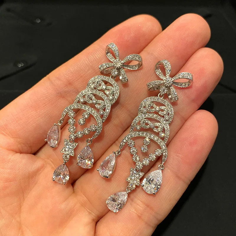 Elegant Bow Drop Tassel Pendant Earrings Fashion Jewelry 2021 For Women Diamond Inlay Earrings Luxury Style Holiday Gifts
Elegant Bow Drop Tassel Pendant Earrings Fashion Jewelry 2021 For Women Diamond Inlay Earrings Luxury Style Holiday Gifts