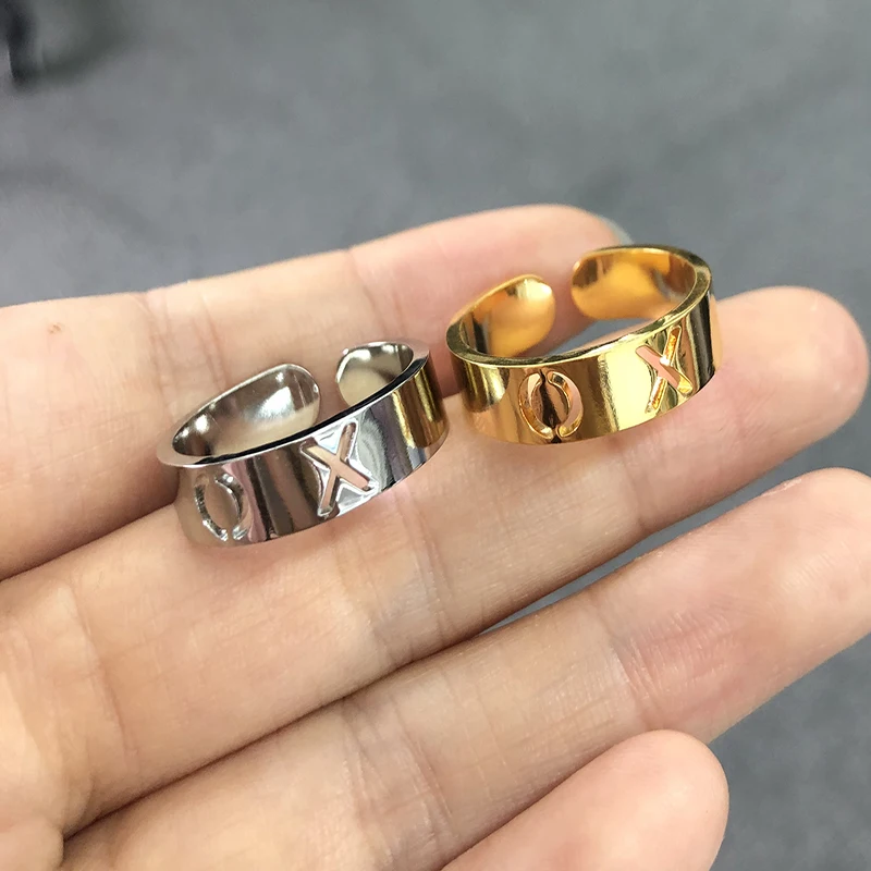 Opening Adjustable Stainless Steel Couple Ring Hollow Letter XO Rings For Women Men Gold Color Punk Hug and Kiss Jewelry
Opening Adjustable Stainless Steel Couple Ring Hollow Letter XO Rings For Women Men Gold Color Punk Hug and Kiss Jewelry