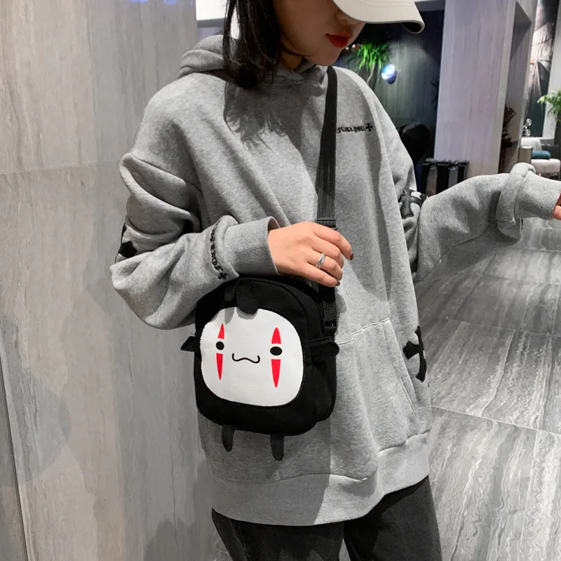 Korean women cute small shoulder bag female 2021 small round bag with monster cartoon canvas messenger bag
Korean women cute small shoulder bag female 2021 small round bag with monster cartoon canvas messenger bag