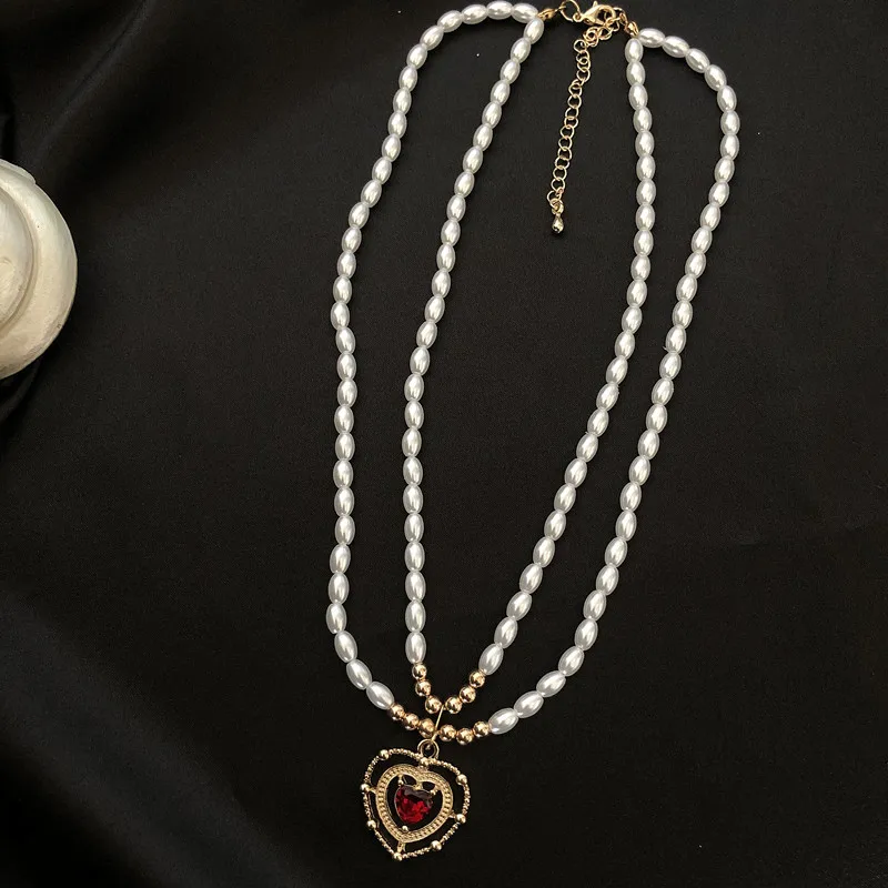 Elegant Fashion Imitation Pearl Chain Double Layer Necklaces Vintage Korean Party Jewelry Heart Pendant Necklaces For Women Gift
Elegant Fashion Imitation Pearl Chain Double Layer Necklaces Vintage Korean Party Jewelry Heart Pendant Necklaces For Women Gift