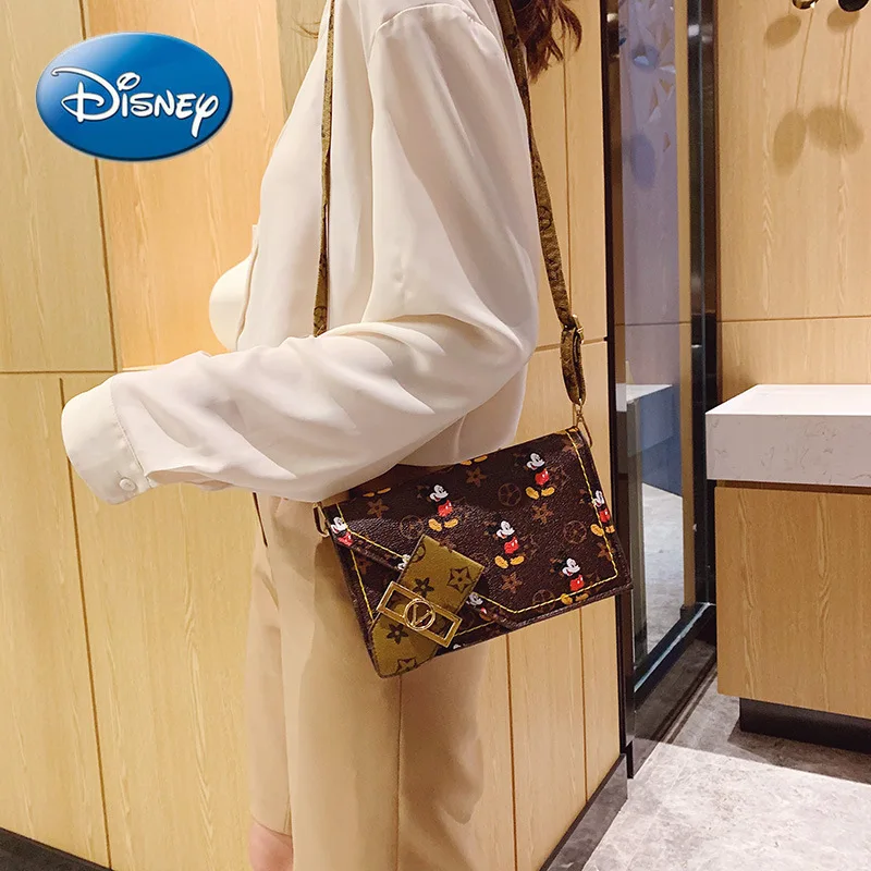 Disney Mickey Mouse Small wallet Square Bag Cute Messenger Bag Retro Lock Cross Body Bag Woman Waist Bag Women
Disney Mickey Mouse Small wallet Square Bag Cute Messenger Bag Retro Lock Cross Body Bag Woman Waist Bag Women